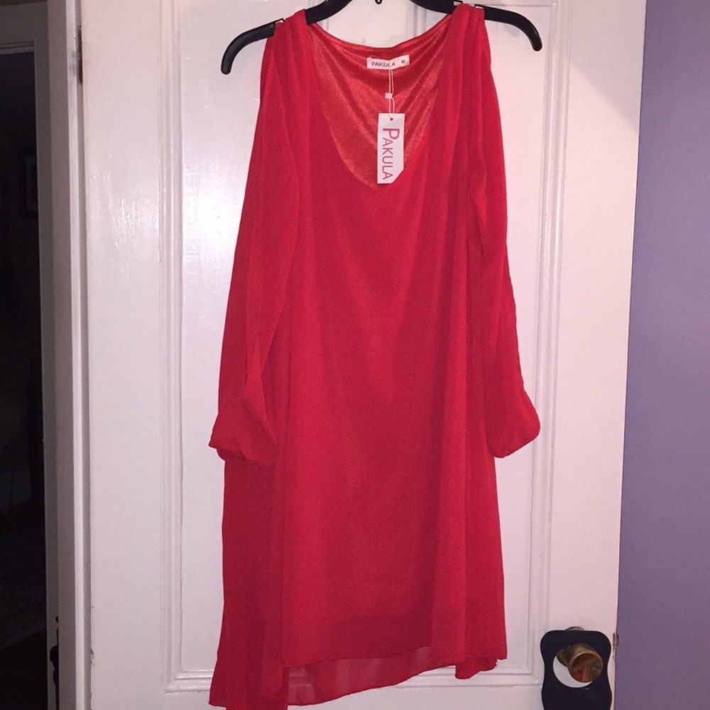 Beautiful vibrant red dress with slit sleeves.